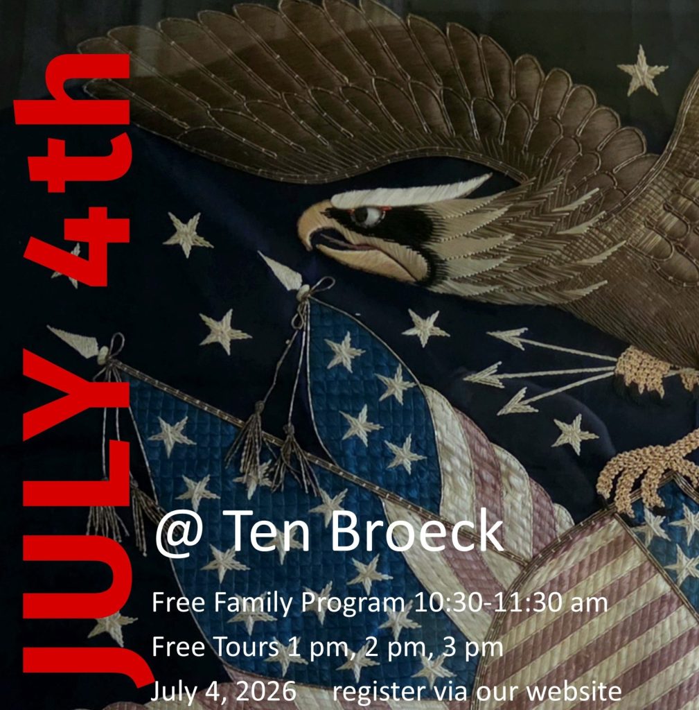 Image of eagle with flag created with textiles.